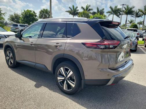 Baja Storm Metallic/Super Black 2024 Nissan Rogue SL