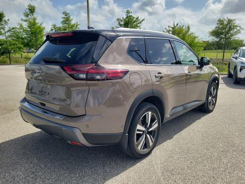 Baja Storm Metallic/Super Black 2024 Nissan Rogue SL