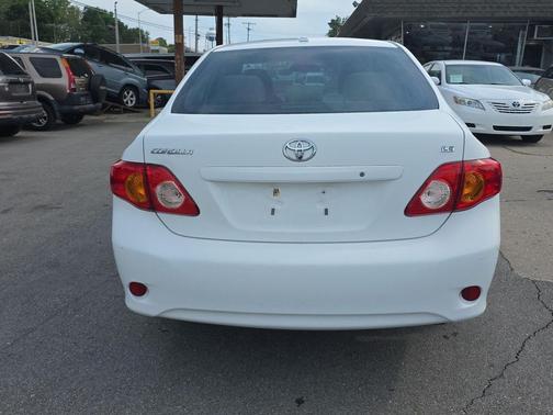 Super White 2010 Toyota Corolla LE