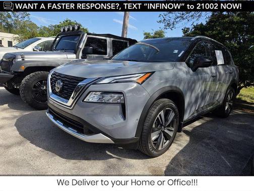 Boulder Gray Pearl/Super Black 2023 Nissan Rogue Platinum