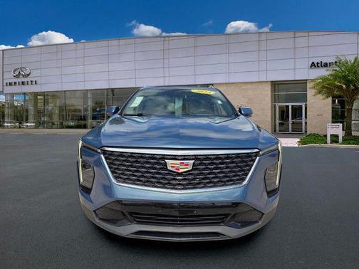 Deep Sea Metallic 2024 Cadillac XT4 Premium Luxury