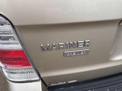 Gold Leaf Metallic 2010 Mercury Mariner Premier