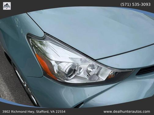 Blue 2015 Toyota Prius v Three