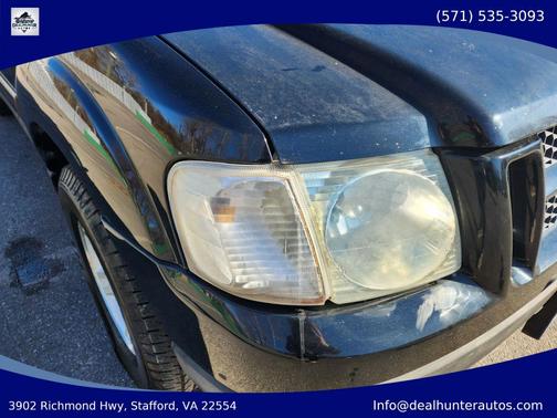 Black 2003 Ford Explorer Sport Trac XLS
