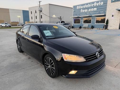 Black Uni 2016 Volkswagen Jetta 1.8T Sport