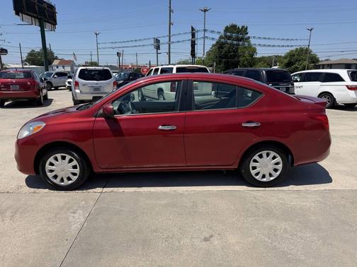 Red Brick 2013 Nissan Versa 1.6 S