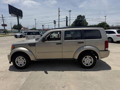 Tan 2010 Dodge Nitro SE