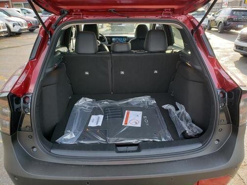 Scarlet Ember Tintcoat 2026 Nissan Kicks SR