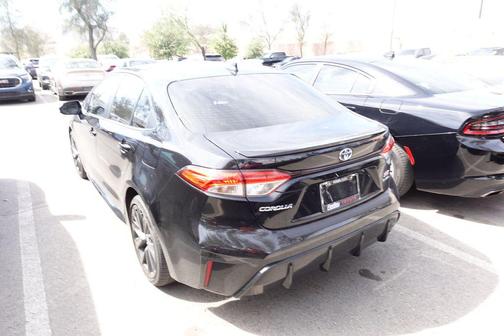 Midnight Black Metallic 2025 Toyota Corolla Hybrid SE