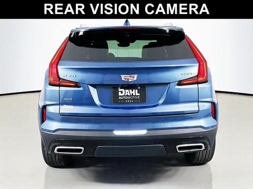 Deep Sea Metallic 2024 Cadillac XT4 Premium Luxury