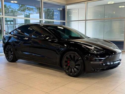 Solid Black 2023 Tesla Model 3 Performance