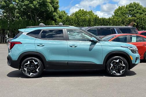 Blue 2024 Kia Seltos EX