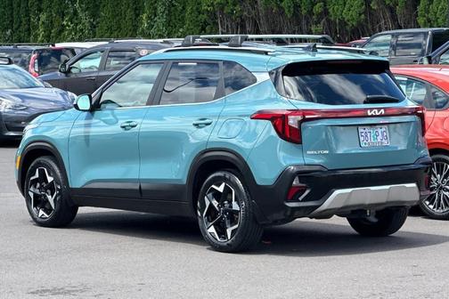 Blue 2024 Kia Seltos EX