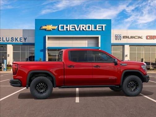 Volcanic Red Tintcoat 2026 GMC Sierra 1500 AT4X