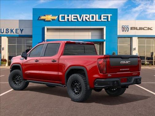 Volcanic Red Tintcoat 2026 GMC Sierra 1500 AT4X