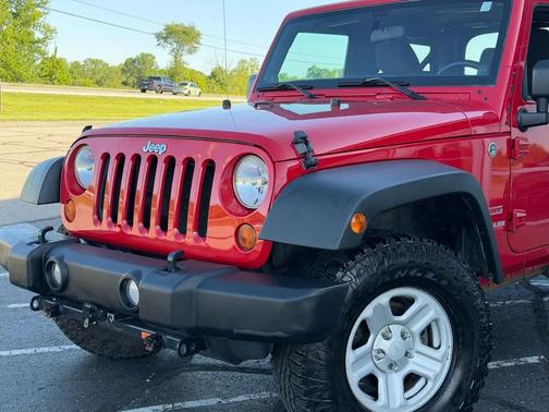 Red 2011 Jeep Wrangler Sport