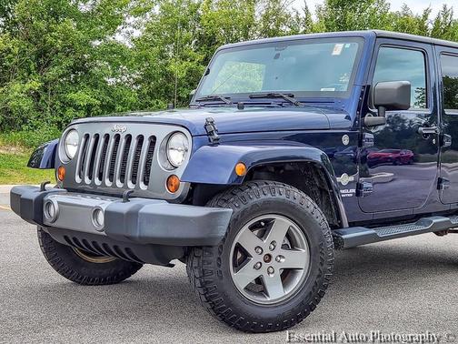 True Blue Pearlcoat 2012 Jeep Wrangler Unlimited Sport