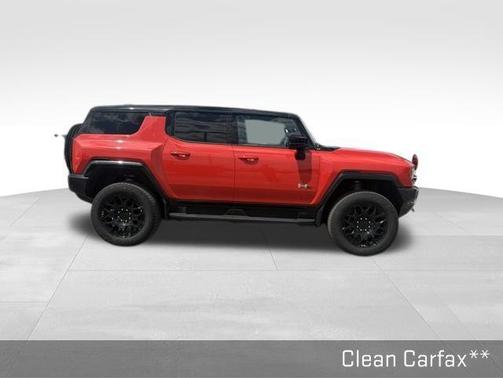 Orange 2026 GMC HUMMER EV SUV 2X