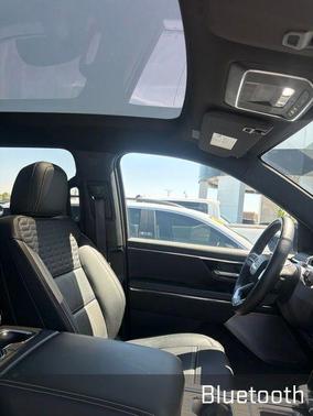 Gray 2025 GMC Sierra EV Denali