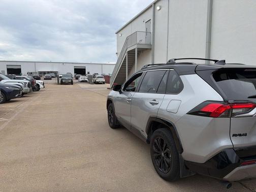 Silver Sky Metallic/Midnight Black Metallic 2024 Toyota RAV4 Hybrid SE