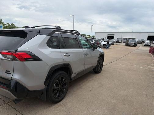 Silver Sky Metallic/Midnight Black Metallic 2024 Toyota RAV4 Hybrid SE