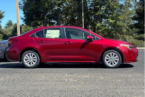 Ruby Flare Pearl 2026 Toyota Corolla Hybrid XLE