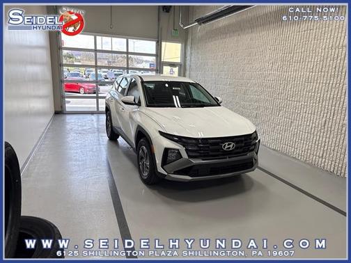 Creamy White Pearl 2026 Hyundai TUCSON Hybrid Blue SE