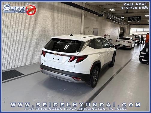 Creamy White Pearl 2026 Hyundai TUCSON Hybrid Blue SE