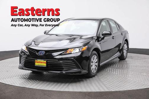 Midnight Black Metallic 2024 Toyota Camry Hybrid LE