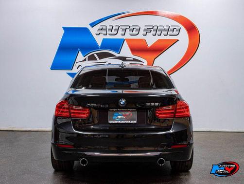 Black Sapphire Metallic 2014 BMW 335 335i, AWD, 6-SPD MANUAL, PREMIUM PKG, 18' WHEELS, LUXURY LINE