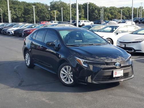 Midnight Black Metallic 2025 Toyota Corolla Hybrid LE