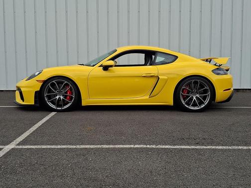 Racing Yellow 2023 Porsche 718 Cayman GT4