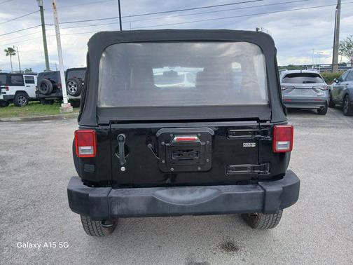 Black Clearcoat 2012 Jeep Wrangler Unlimited Sport