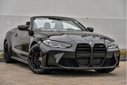 Black Sapphire Metallic 2024 BMW M4 Competition xDrive