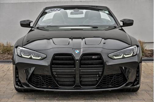 Black Sapphire Metallic 2024 BMW M4 Competition xDrive