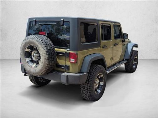 Commando Green 2013 Jeep Wrangler Unlimited Sport