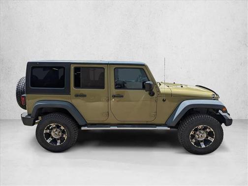 Commando Green 2013 Jeep Wrangler Unlimited Sport