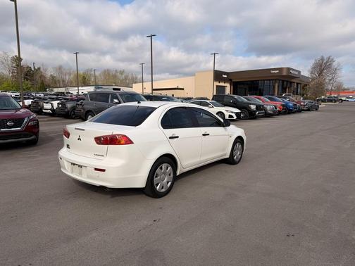 Wicked White Metallic 2009 Mitsubishi Lancer DE