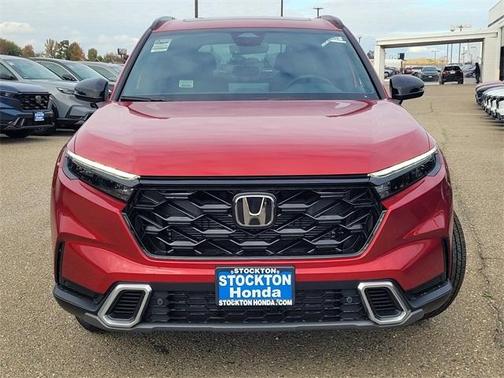 Radiant Red Metallic 2026 Honda CR-V Hybrid Sport Touring