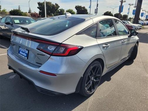 Solar Silver Metallic 2026 Honda Civic Hybrid Sport