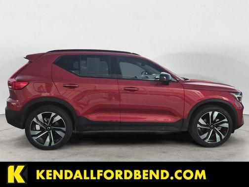 Fusion Red Metallic 2025 Volvo XC40 B5 Plus Dark Theme
