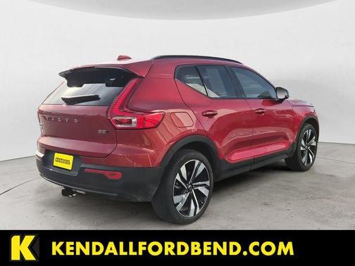 Fusion Red Metallic 2025 Volvo XC40 B5 Plus Dark Theme