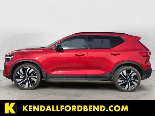 Fusion Red Metallic 2025 Volvo XC40 B5 Plus Dark Theme