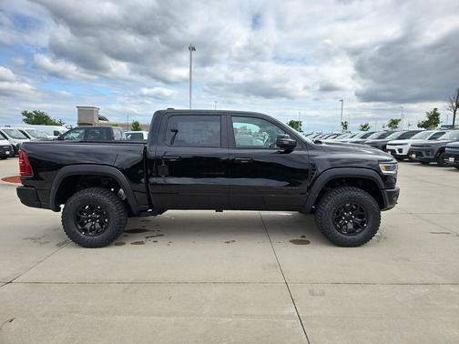Diamond Black Crystal Pearlcoat 2026 RAM 1500 RHO Crew Cab 4x4 5'7' Box