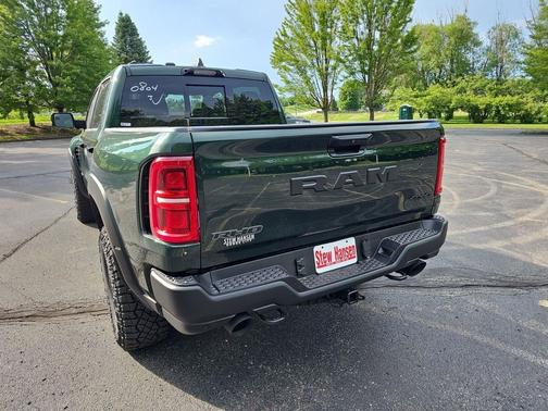 Serrano Green Metallic 2026 RAM 1500 RHO Crew Cab 4x4 5'7' Box