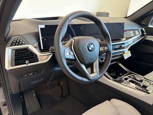 Black Sapphire Metallic 2026 BMW X5 PHEV xDrive50e