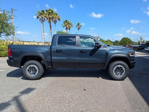 Blue Metallic 2026 RAM 1500 RHO Crew Cab 4x4 5'7' Box