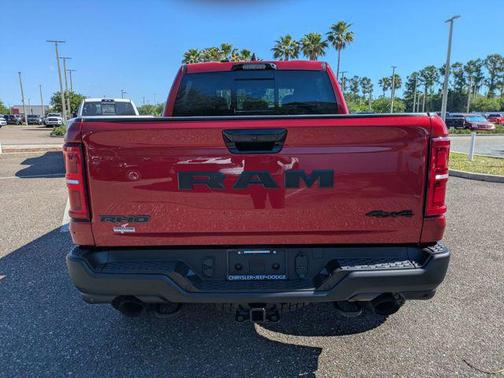 Molten Red 2026 RAM 1500 RHO Crew Cab 4x4 5'7' Box