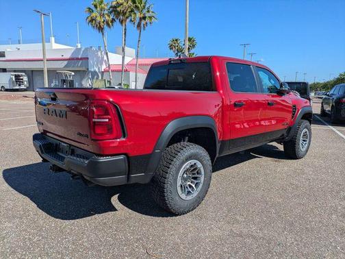 Molten Red 2026 RAM 1500 RHO Crew Cab 4x4 5'7' Box