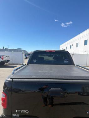 Black Clearcoat 2003 Ford F-150 XLT SuperCrew